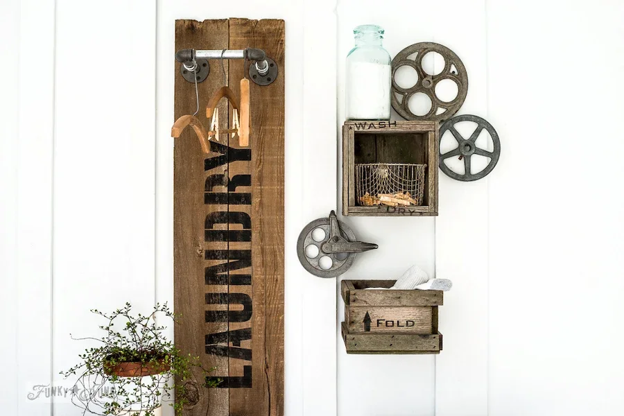 Wood and metal laundry sign