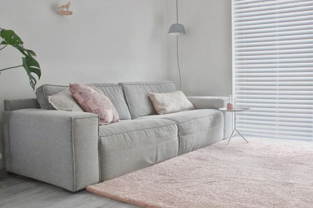 light pink rug for gray sofa